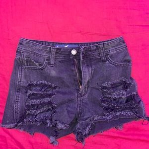 Black ripped Jean shorts.
